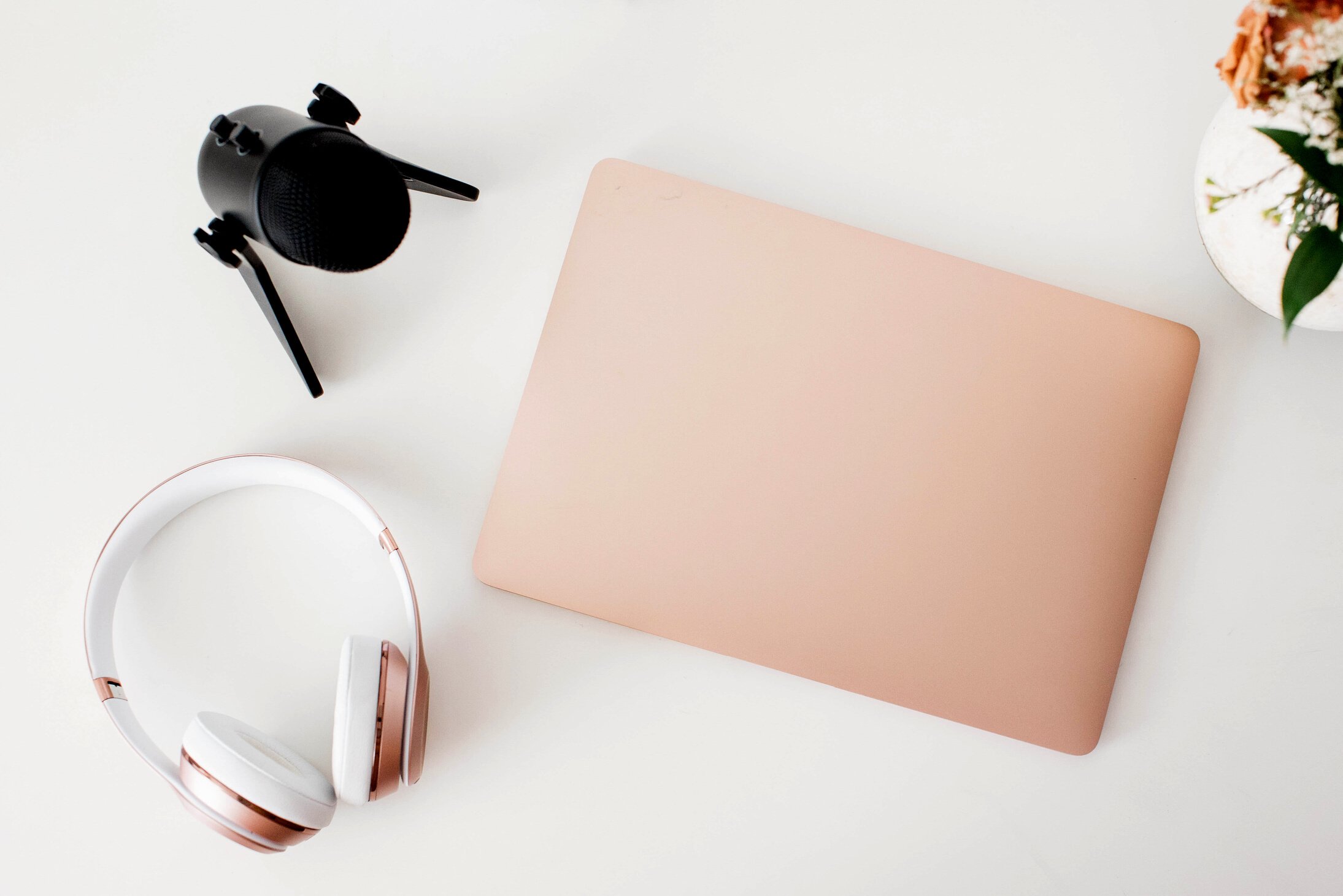 Wireless Microphone, Headphones and Laptop for Podcasting Flatlay